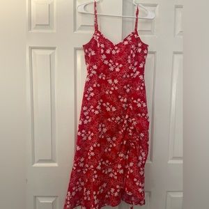 Eye catching red dress.